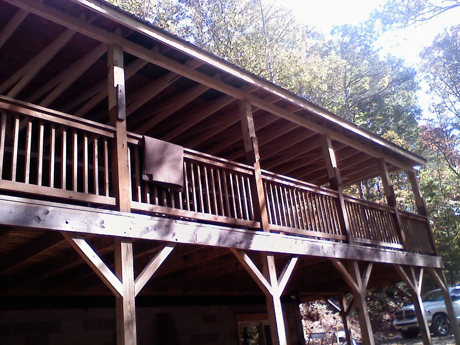 Timber framing under a new elevated porch and deck — Roof Leak Repair in Loudon by Roofing Brothers